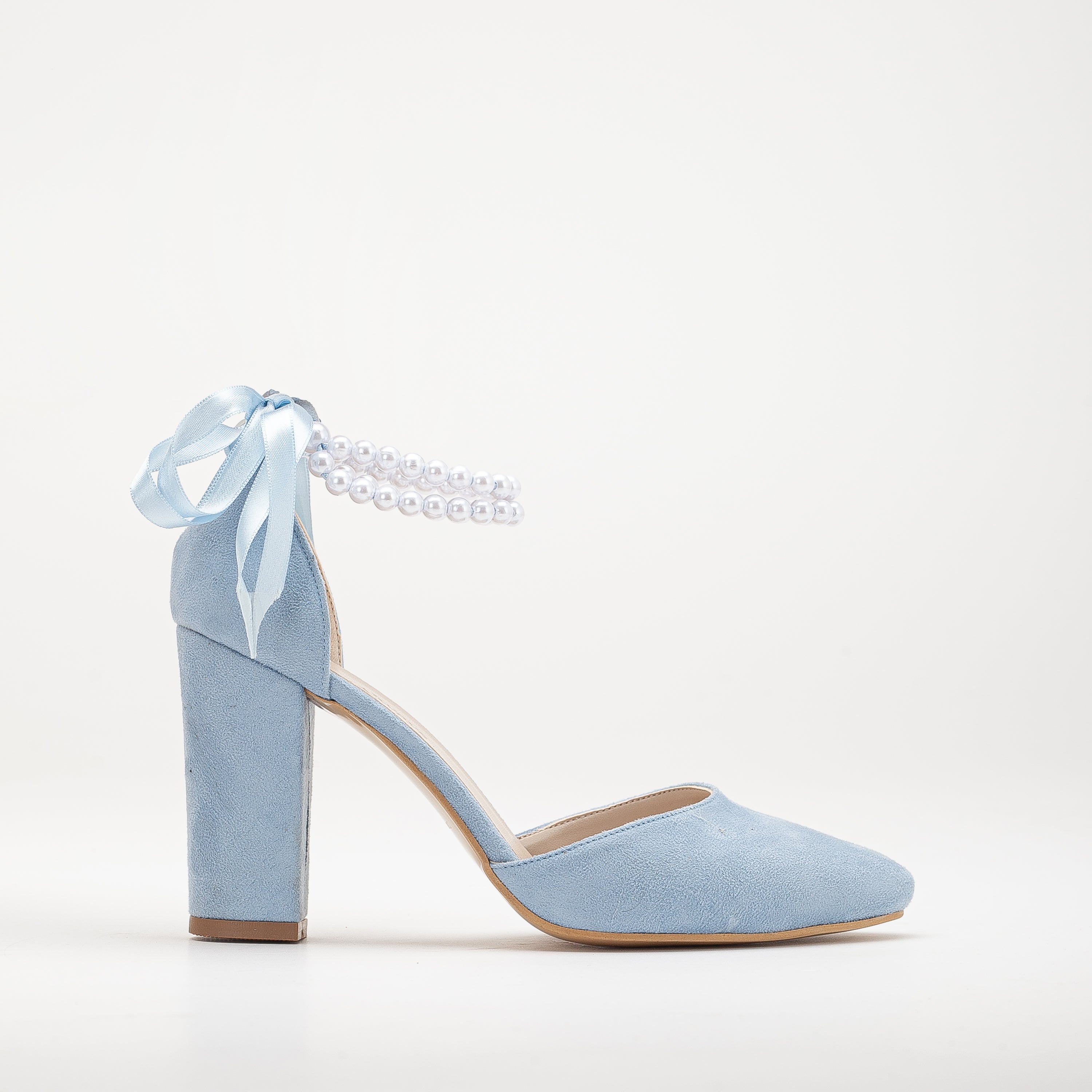Baby blue closed-toe heels, Elegant sky blue pumps, Formal blue high heels, Classic closed-toe blue shoes, Chic baby blue footwear, Sophisticated bridal heels, Stylish closed-toe blue heels, Trendy baby blue pumps, Fashionable high heels in baby blue, Versatile closed-toe blue footwear