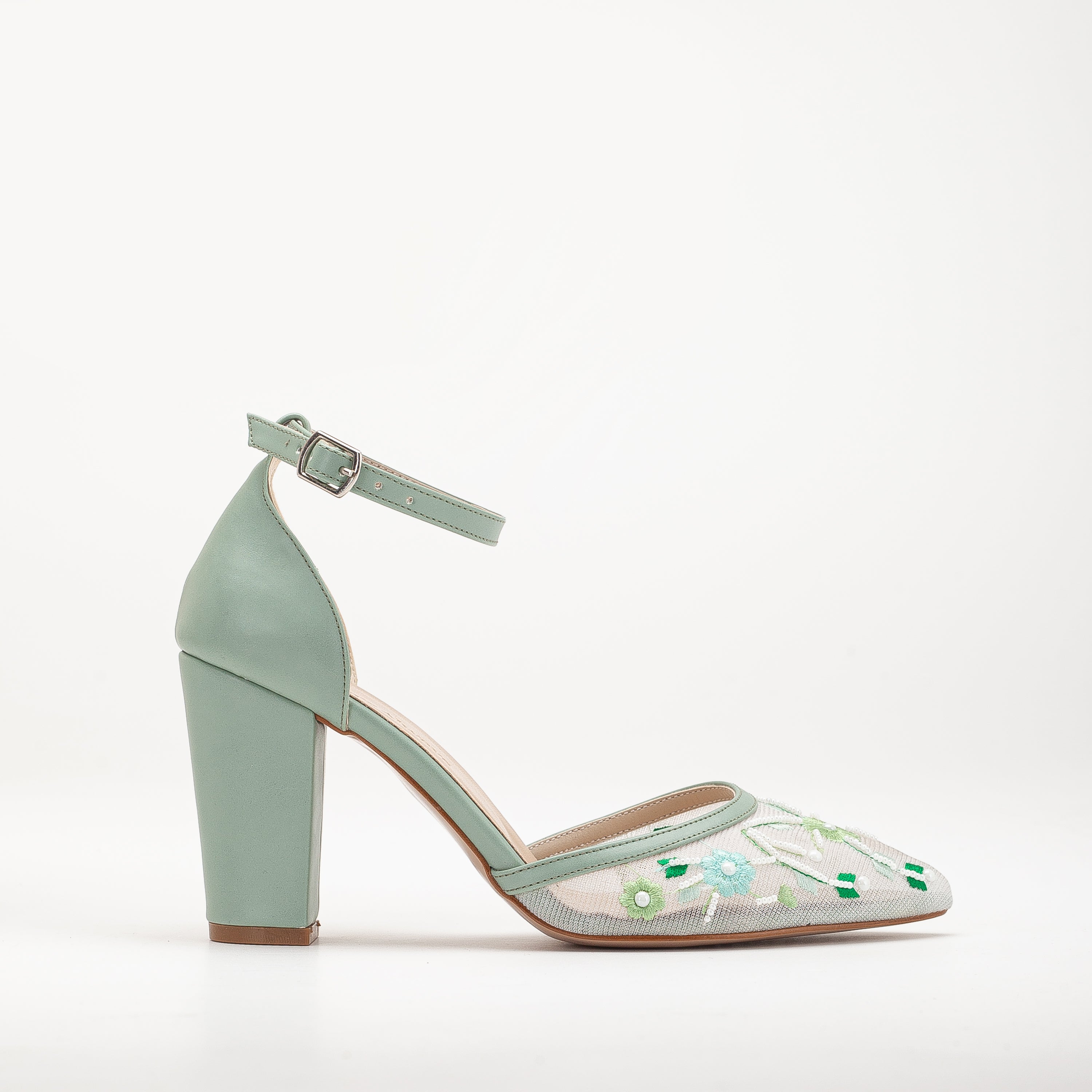 Green heels, Emerald wedding shoes, Stylish green footwear, Elegant green heels, Vibrant bridal heels, Green wedding pumps, Chic green high heels, Trendy bridal footwear, Fashionable green heels, Unique wedding shoes