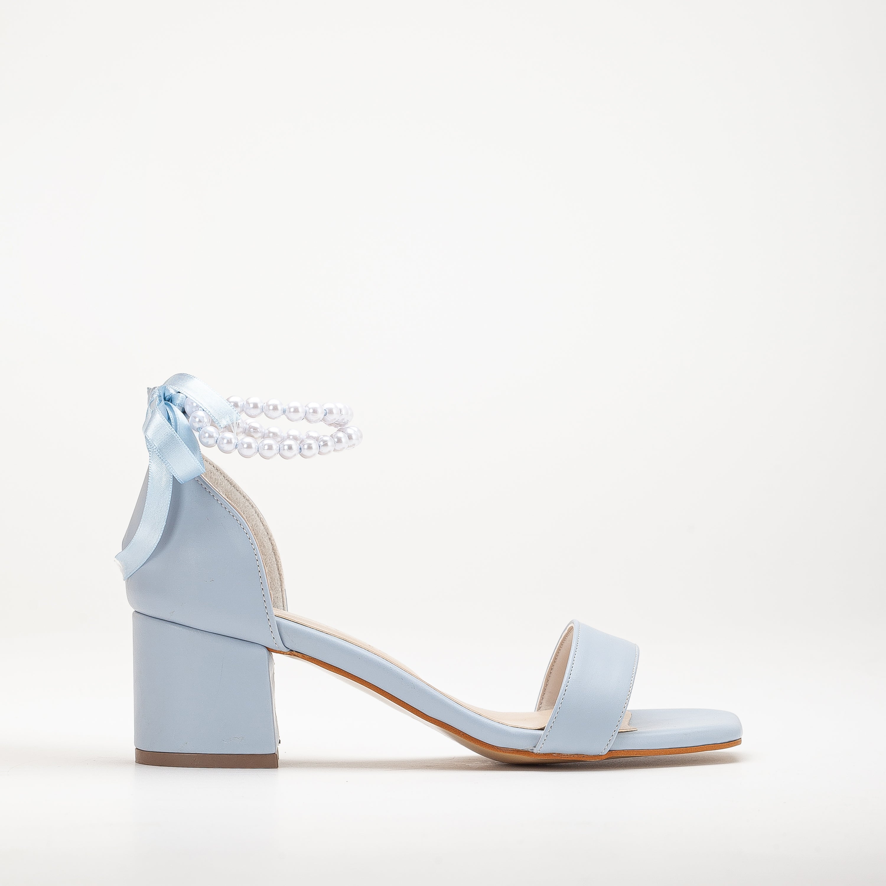 baby blue sandals with pearls on the ankle, pearl ankle strap baby blue sandals, baby blue pearl embellished sandals, baby blue sandals with ankle pearls, pearl decorated baby blue ankle sandals, baby blue sandals with pearl ankle strap, baby blue pearl ankle sandals, baby blue pearl studded ankle sandals, baby blue sandals pearl ankle detail, pearl ankle baby blue dress sandals