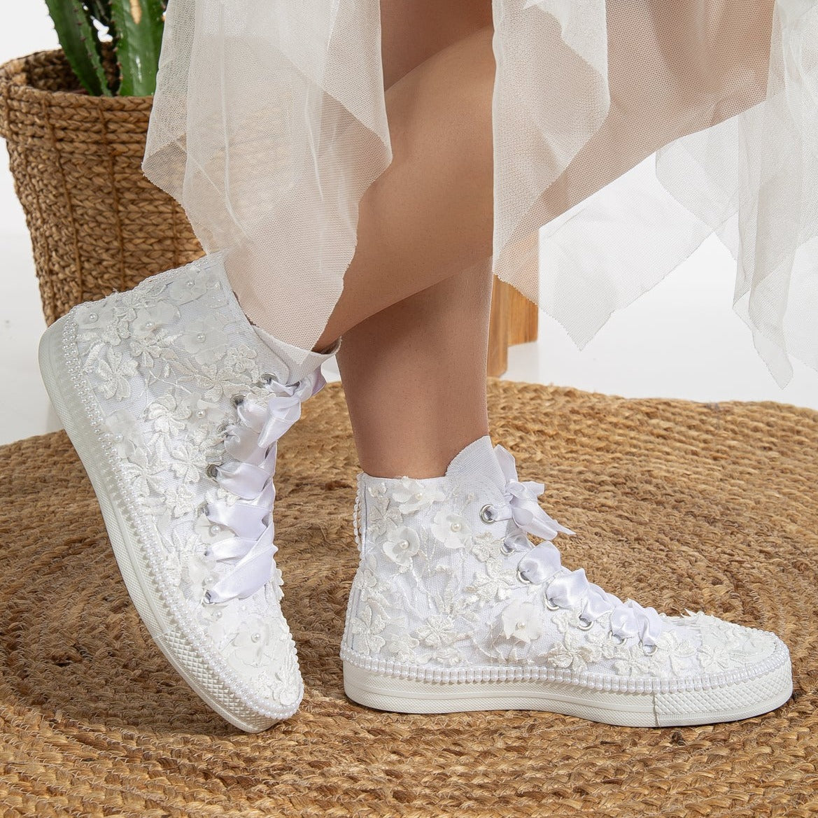 converse, white lace sneakers, lace-up white sneakers, white lace tennis shoes, lace detailed white sneakers, white lace casual shoes, white lace running shoes, women's white lace sneakers, white lace trainers, white lace slip-on sneakers, white lace fashion sneakers