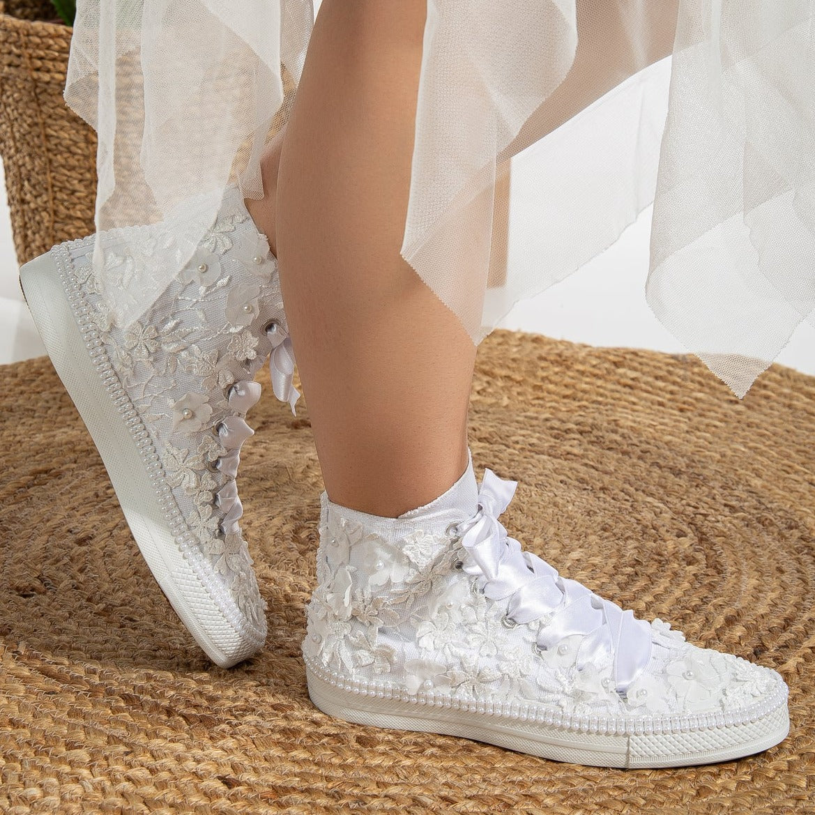 converse, white lace sneakers, lace-up white sneakers, white lace tennis shoes, lace detailed white sneakers, white lace casual shoes, white lace running shoes, women's white lace sneakers, white lace trainers, white lace slip-on sneakers, white lace fashion sneakers