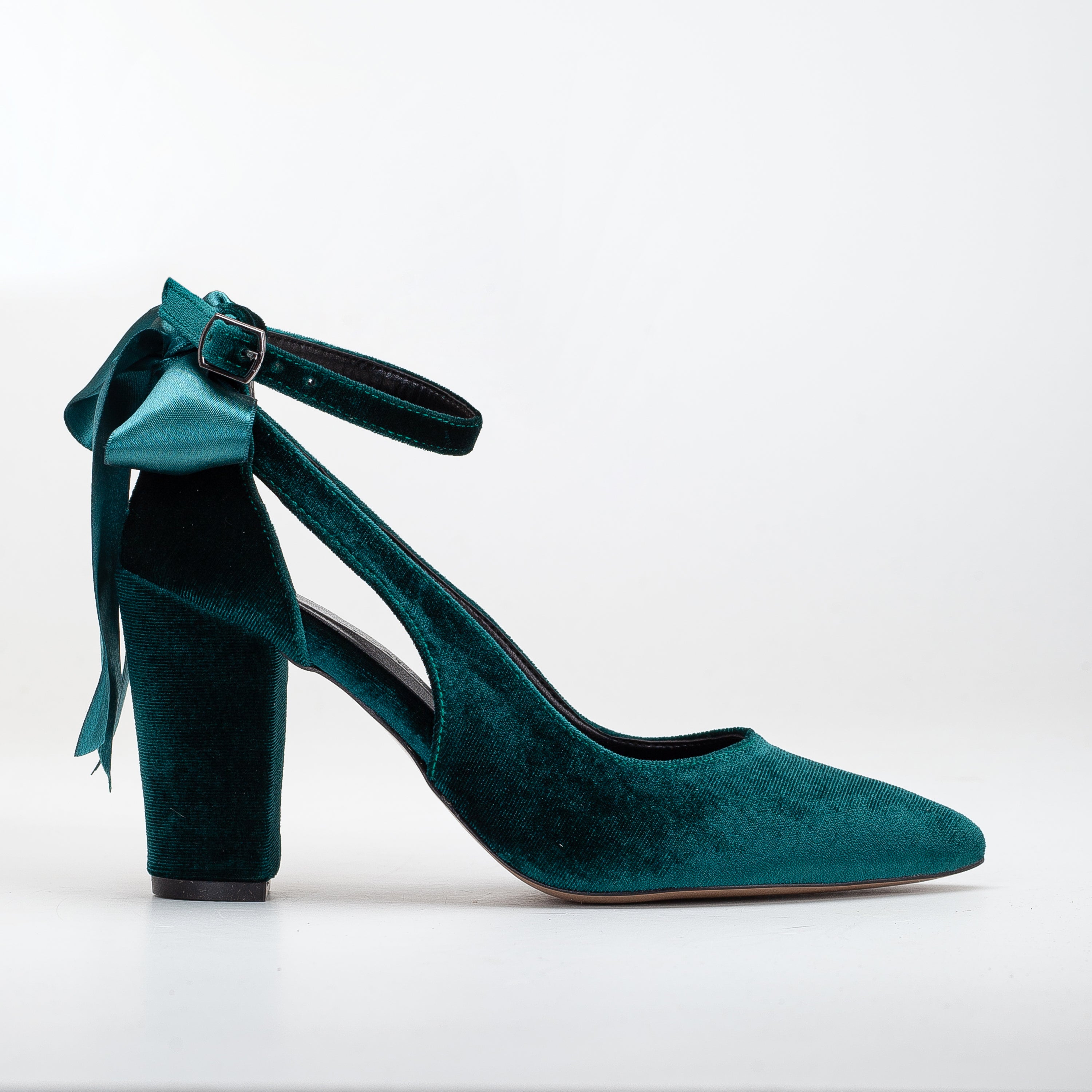 vegan green velvet heels, green velvet footwear, cruelty-free shoes, eco-friendly fashion, sustainable heels, plant-based velvet, green vegan heels, non-leather heels, animal-free footwear, ethical fashion, velvet vegan heels, luxurious green heels, stylish vegan shoes, emerald velvet heels, soft vegan velvet, women's vegan footwear